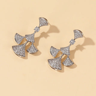 Sterling silver cascade earrings feature an elegant cascading design with sparkling zirconia stones.