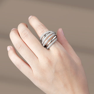 Sterling silver Dazzle Ring with 18k white gold plating and pavé zirconia bands. Adjustable size