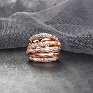 Sterling silver Dazzle Ring with 18k rose gold plating and pavé zirconia bands