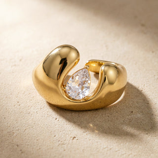 Open Dome Ring in 18K gold, close-up product shot on a neutral background